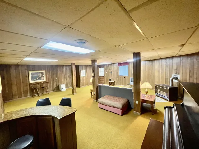 a view of a living room and dining room