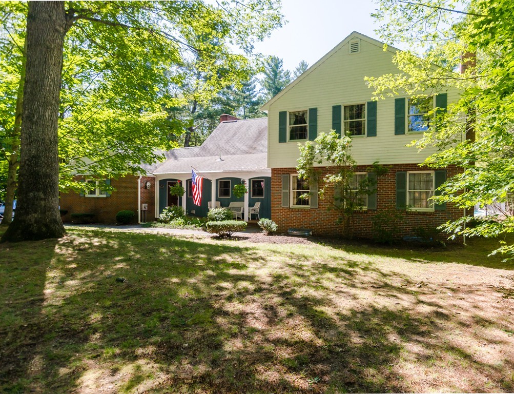 60 Birch Meadow Road Merrimac, MA 01860 - Photo 1 of 27 a front view of a house with a garden
