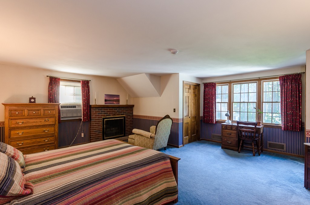 60 Birch Meadow Road Merrimac, MA 01860 - Photo 13 of 27 a bed room with a bed and furniture