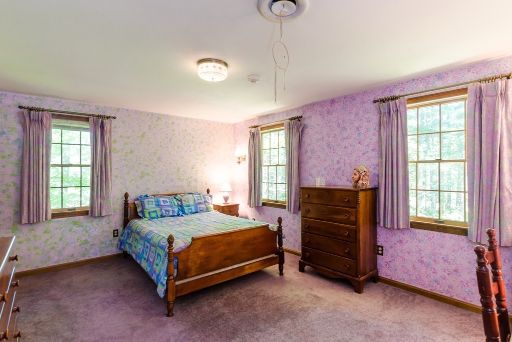 60 Birch Meadow Road Merrimac, MA 01860 - Photo 17 of 27 a bedroom with a bed and a dresser