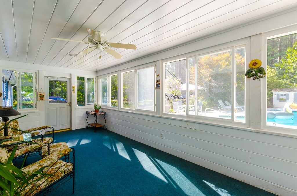 60 Birch Meadow Road Merrimac, MA 01860 - Photo 21 of 27 a living room with furniture and a large window
