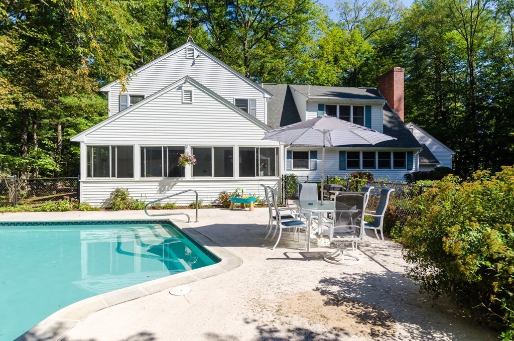 60 Birch Meadow Road Merrimac, MA 01860 - Photo 22 of 27 a front view of a house with swimming pool and porch
