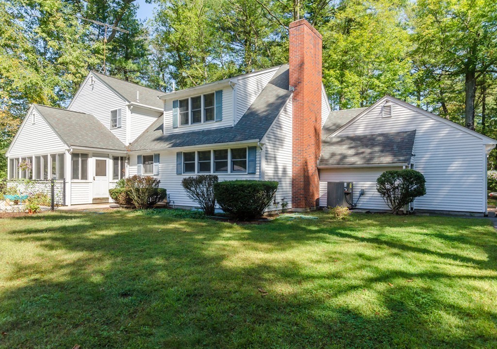 60 Birch Meadow Road Merrimac, MA 01860 - Photo 23 of 27 a view of a house with a backyard and a patio