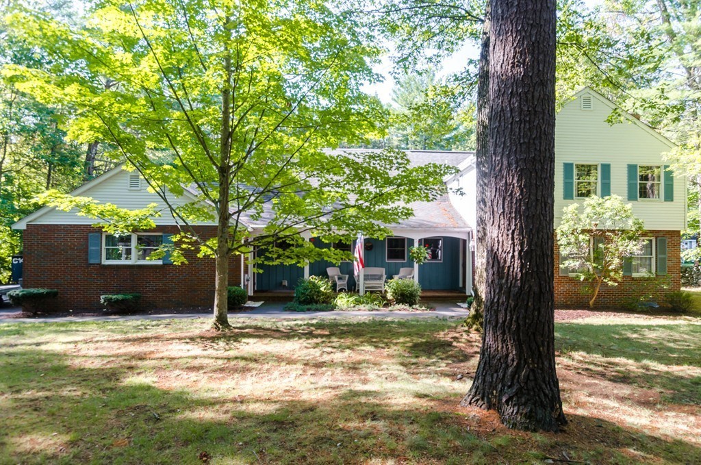 60 Birch Meadow Road Merrimac, MA 01860 - Photo 26 of 27 a front view of a house with a tree in a yard