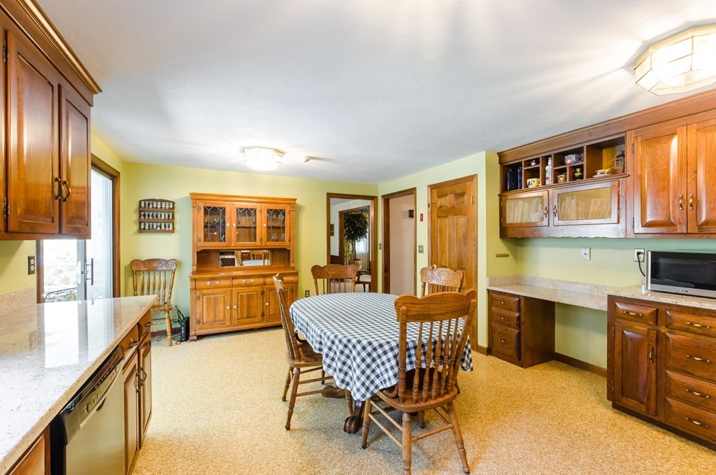 60 Birch Meadow Road Merrimac, MA 01860 - Photo 5 of 27 a view of a dining room with furniture window and wooden floor