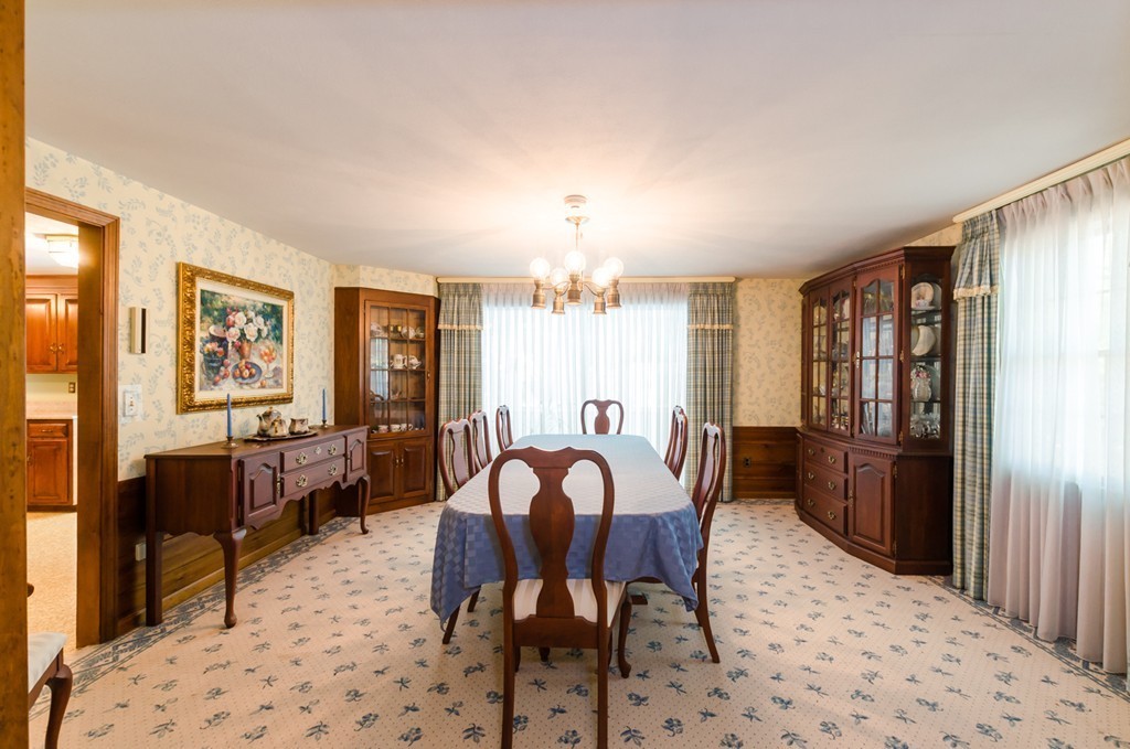 60 Birch Meadow Road Merrimac, MA 01860 - Photo 8 of 27 a view of a a dining room with furniture window and wooden floor