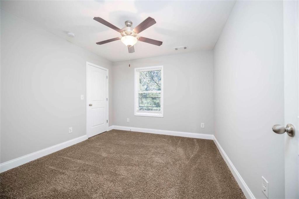 68 Crescent Commons Drive Dallas, GA 30157 - Photo 13 of 26 an empty room with a window