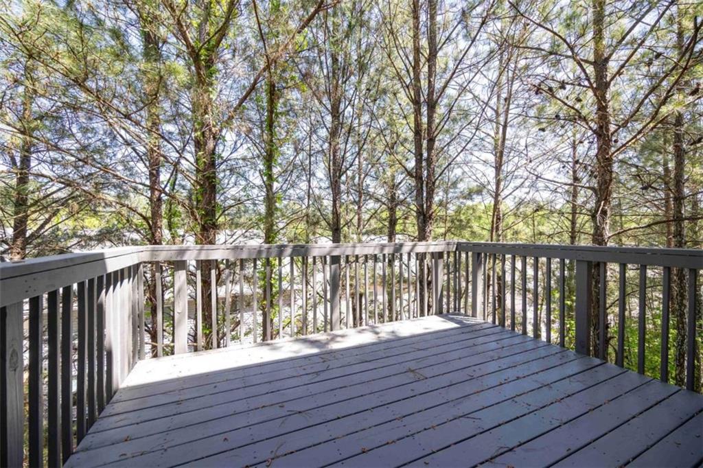 68 Crescent Commons Drive Dallas, GA 30157 - Photo 21 of 26 a balcony with wooden floor and fence