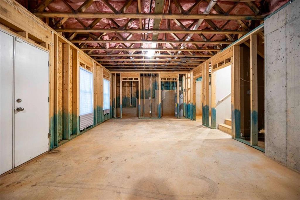 68 Crescent Commons Drive Dallas, GA 30157 - Photo 24 of 26 a view of a hallway with wooden walls