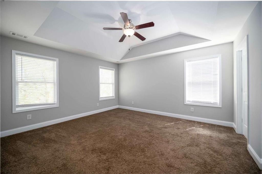 68 Crescent Commons Drive Dallas, GA 30157 - Photo 10 of 26 a view of an empty room with a window