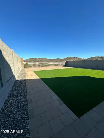 a view of an outdoor space and a yard