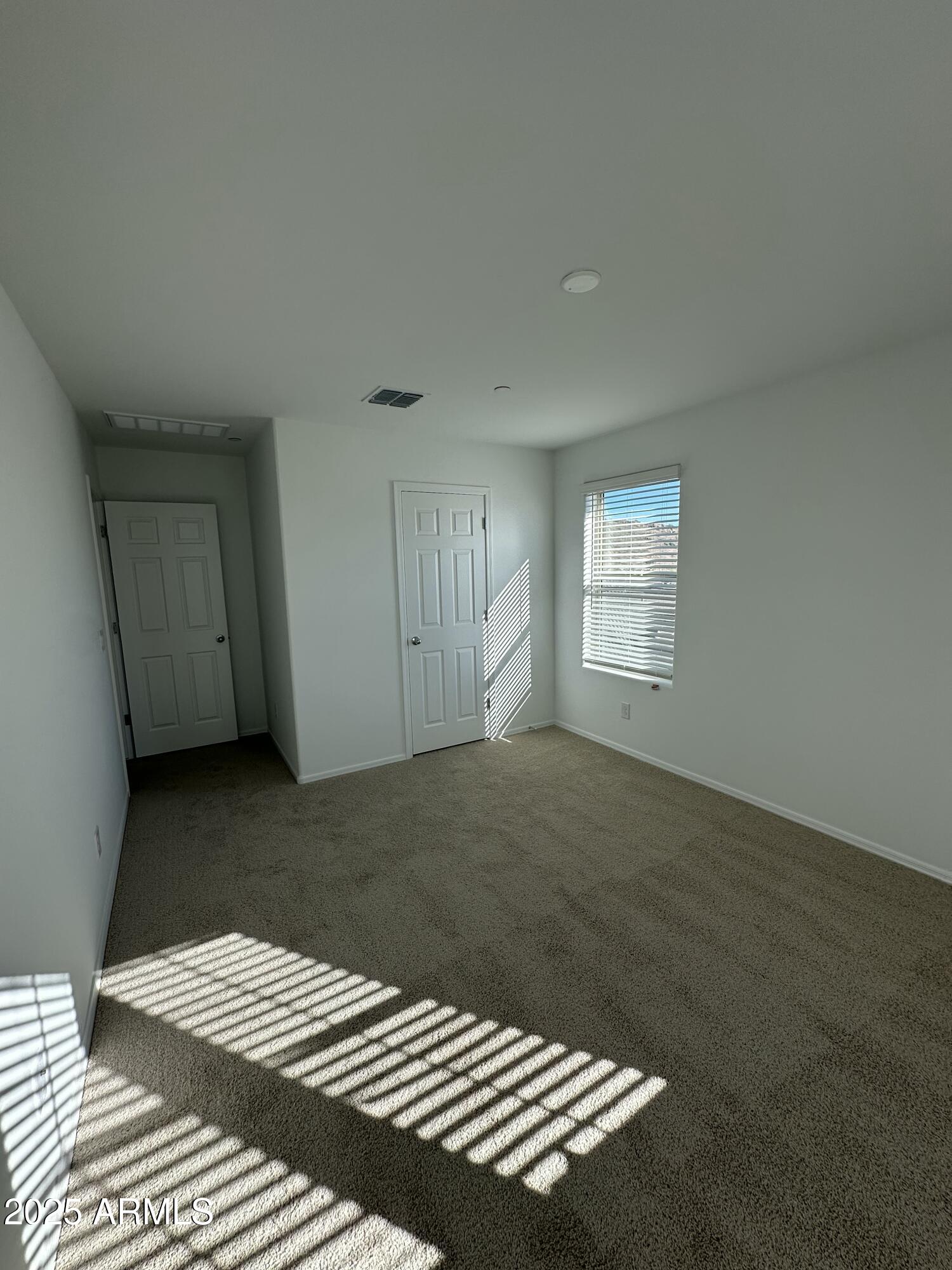 13330 West Eagle Feather Road Peoria, AZ 85383 - Photo 20 of 34 a view of a bedroom