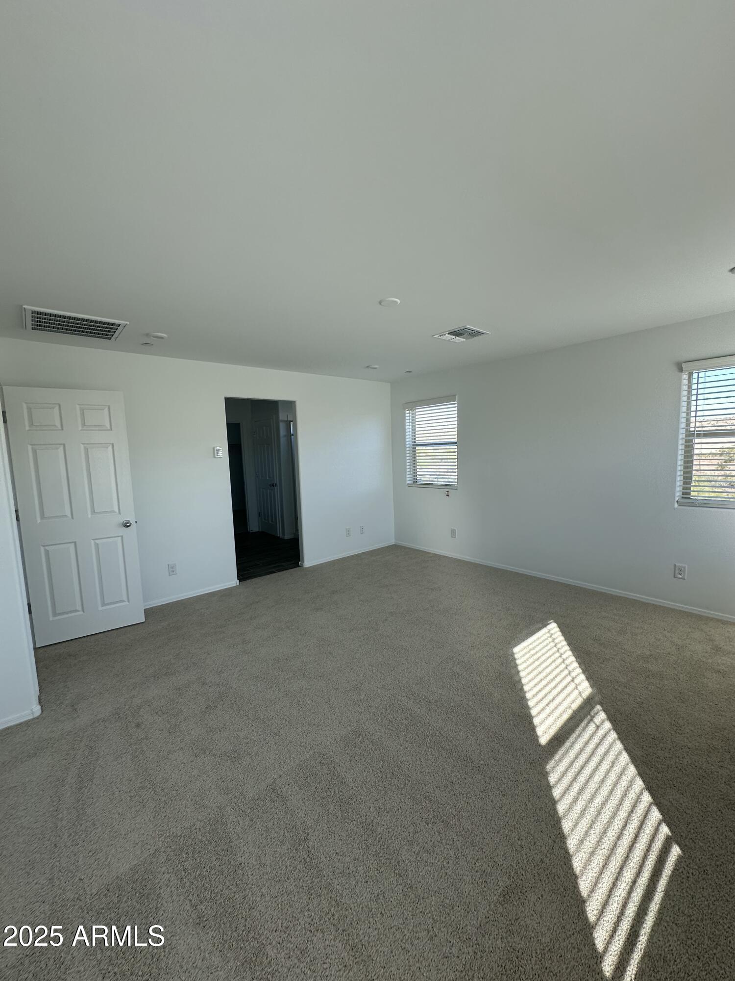 13330 West Eagle Feather Road Peoria, AZ 85383 - Photo 28 of 34 a view of an empty room with a window