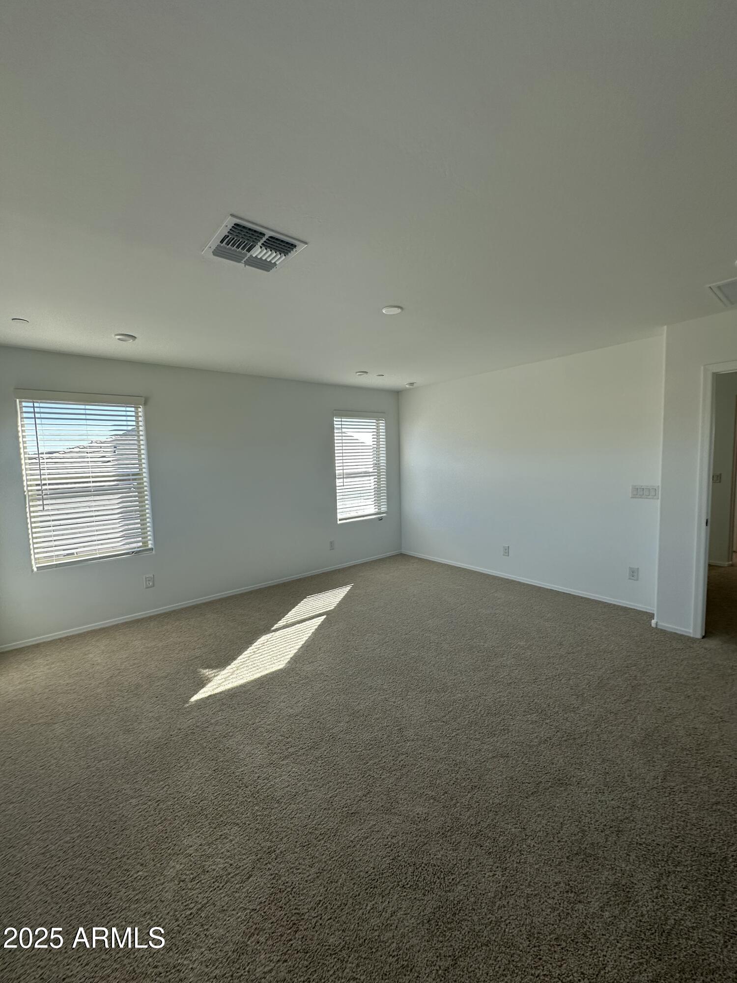 13330 West Eagle Feather Road Peoria, AZ 85383 - Photo 30 of 34 a view of empty room with windows