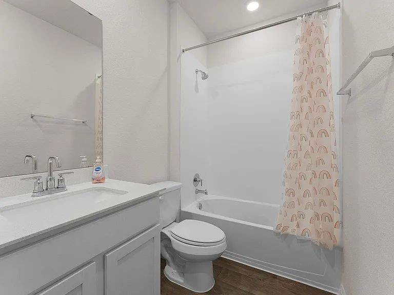 305 Evergreen Sumac Loop Kyle, TX 78640 - Photo 21 of 29 a bathroom with a sink a toilet and shower