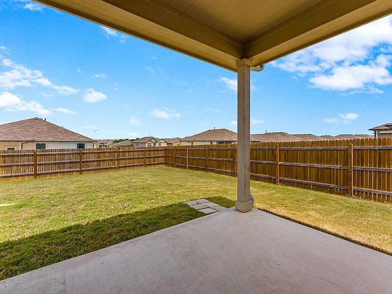 305 Evergreen Sumac Loop Kyle, TX 78640 - Photo 24 of 29 a view of ocean with large building