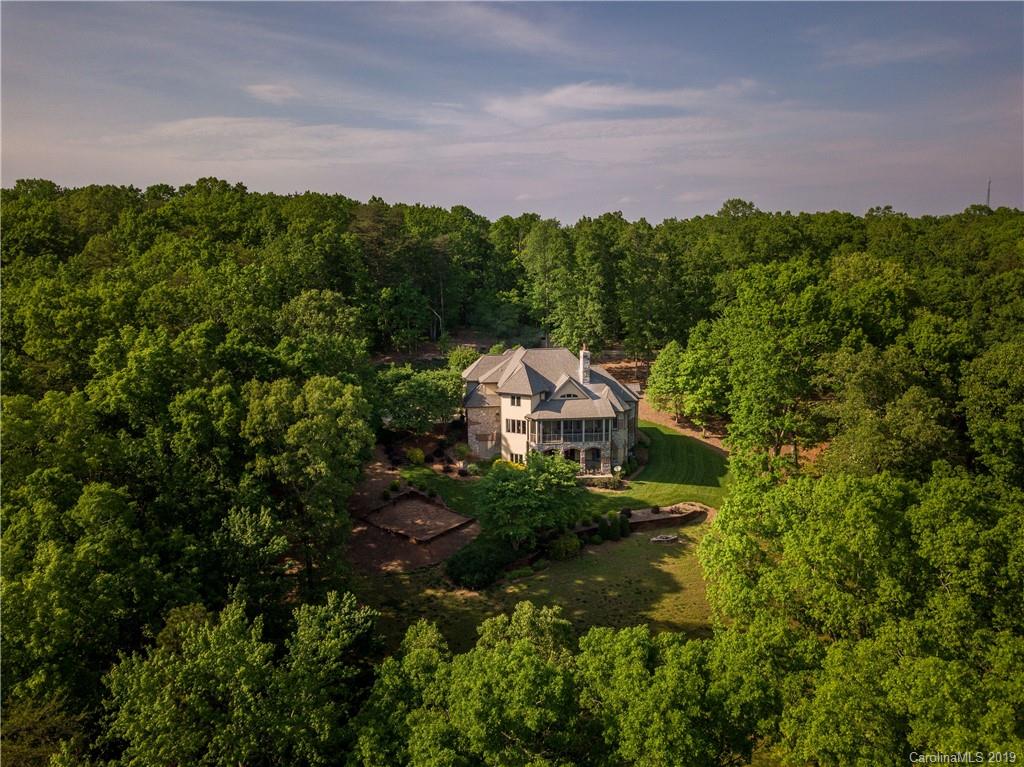 243 Trail Ridge Road Rutherfordton, NC 28139 - Photo 3 of 45 a view of a house with a yard and a wooden fence