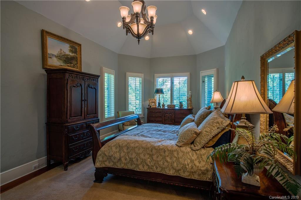 243 Trail Ridge Road Rutherfordton, NC 28139 - Photo 22 of 45 a bedroom with a bed and wooden floor