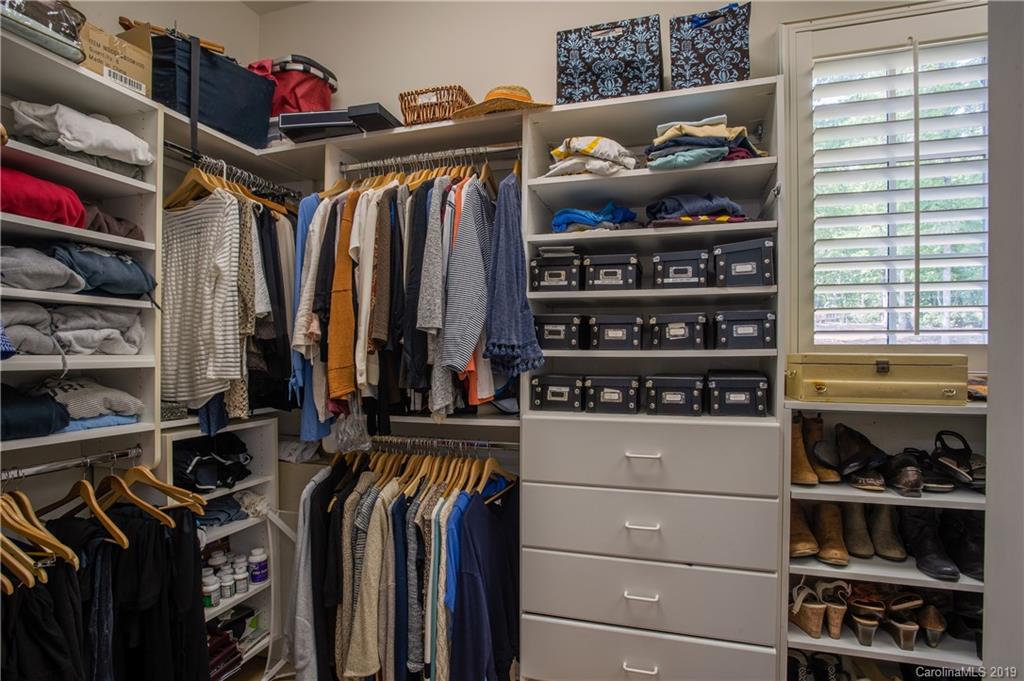 243 Trail Ridge Road Rutherfordton, NC 28139 - Photo 27 of 45 a view of walk in closet with clothes and shoes