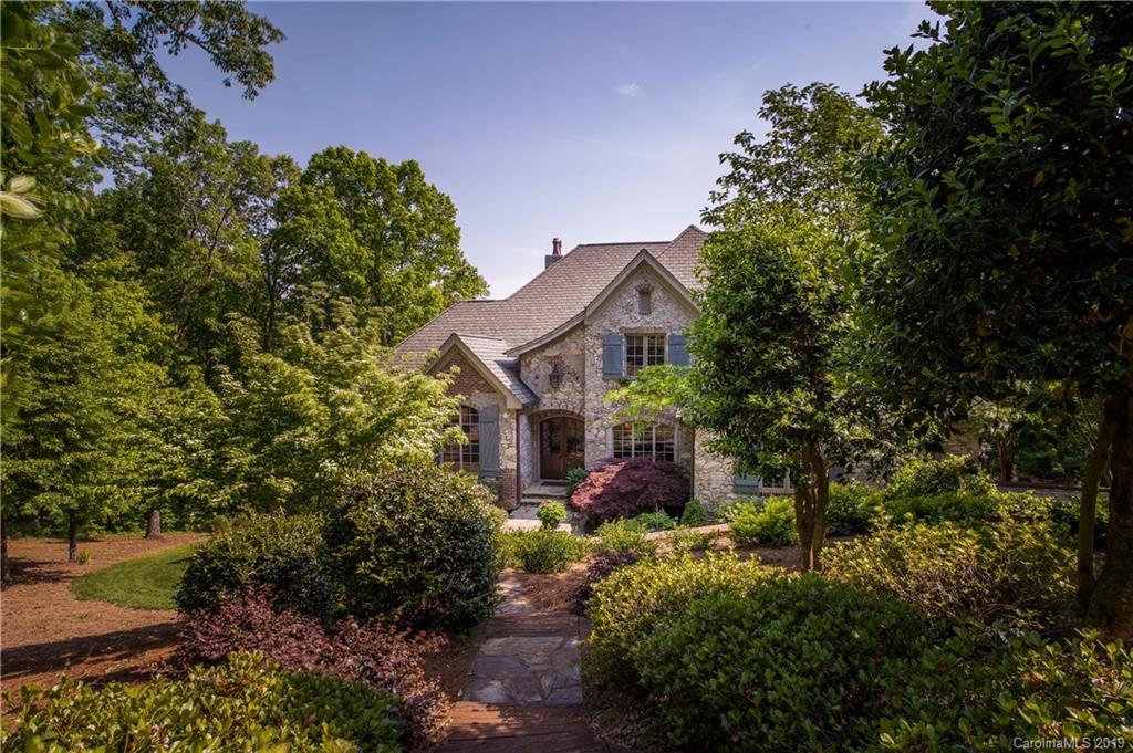 243 Trail Ridge Road Rutherfordton, NC 28139 - Photo 4 of 45 a front view of a house with a yard and fountain