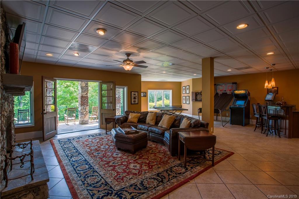 243 Trail Ridge Road Rutherfordton, NC 28139 - Photo 35 of 45 a living room with furniture and a rug