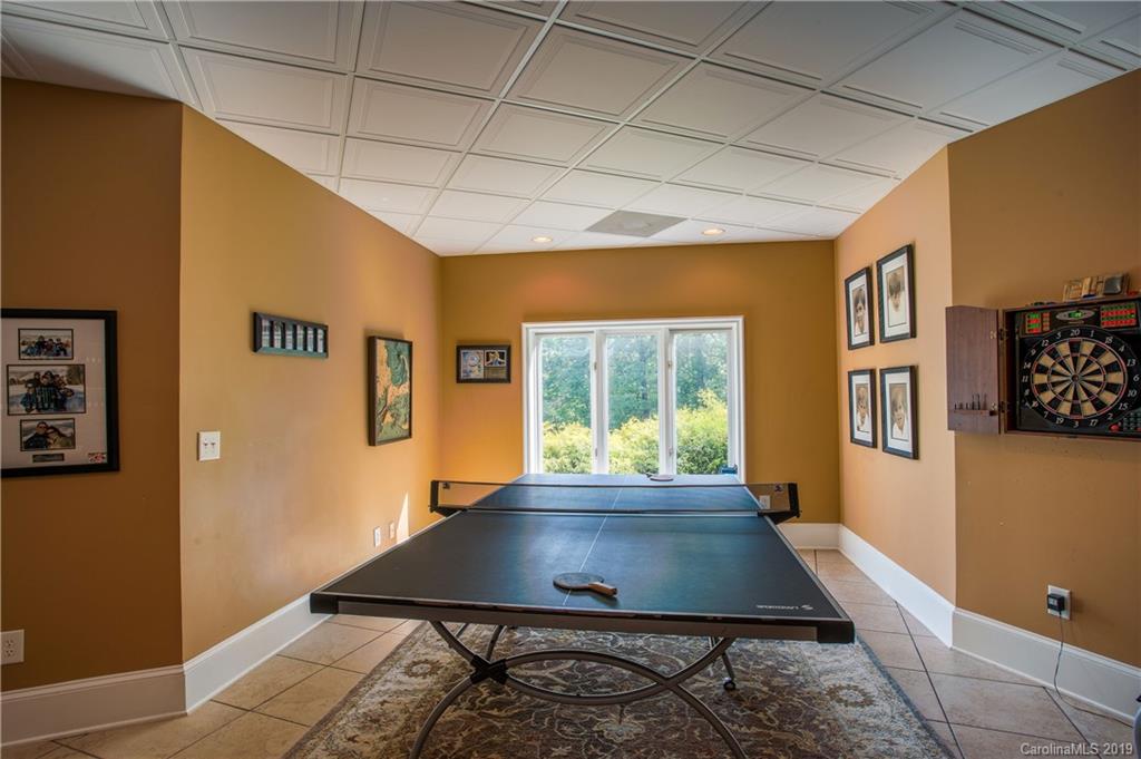 243 Trail Ridge Road Rutherfordton, NC 28139 - Photo 38 of 45 a room with furniture pool table and windows