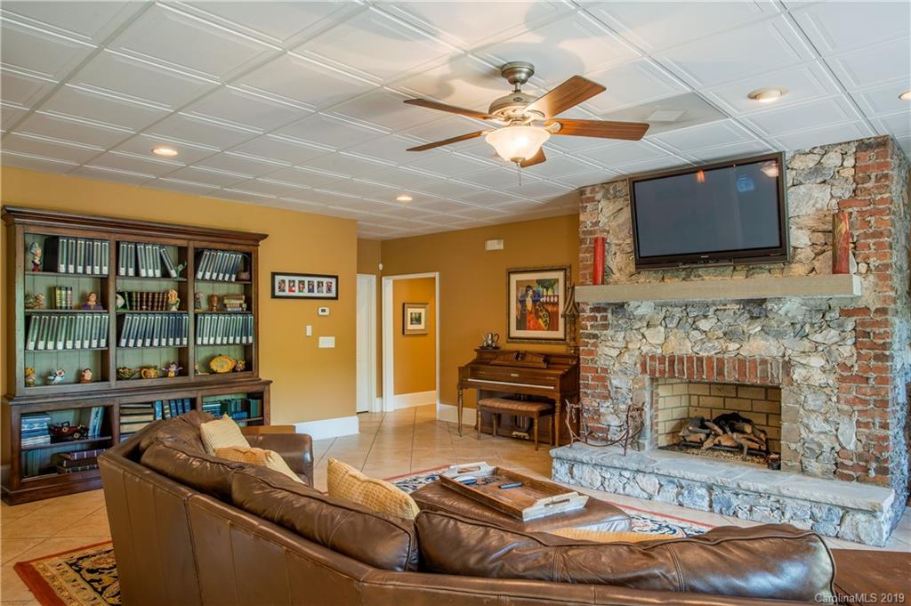 243 Trail Ridge Road Rutherfordton, NC 28139 - Photo 39 of 45 a living room with furniture and a fireplace