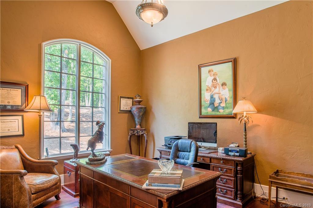 243 Trail Ridge Road Rutherfordton, NC 28139 - Photo 6 of 45 a view of a workspace with furniture and a window