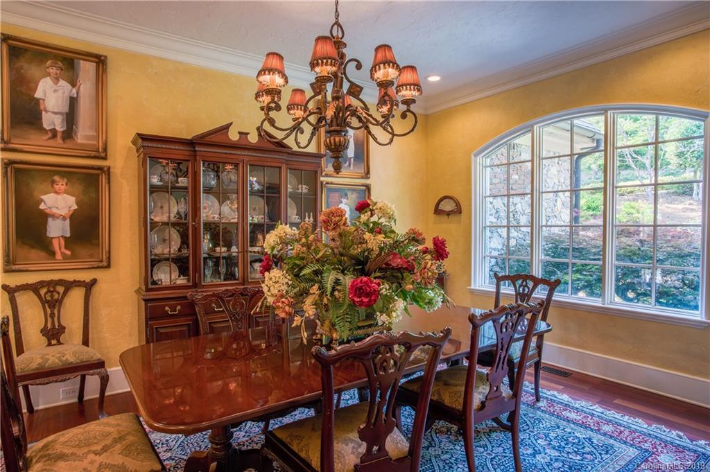 243 Trail Ridge Road Rutherfordton, NC 28139 - Photo 7 of 45 a view of a dining room with furniture and a chandelier