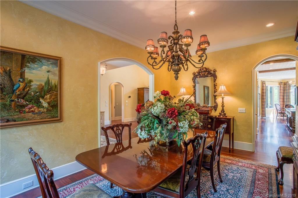 243 Trail Ridge Road Rutherfordton, NC 28139 - Photo 8 of 45 a view of a dining room with furniture and wooden floor