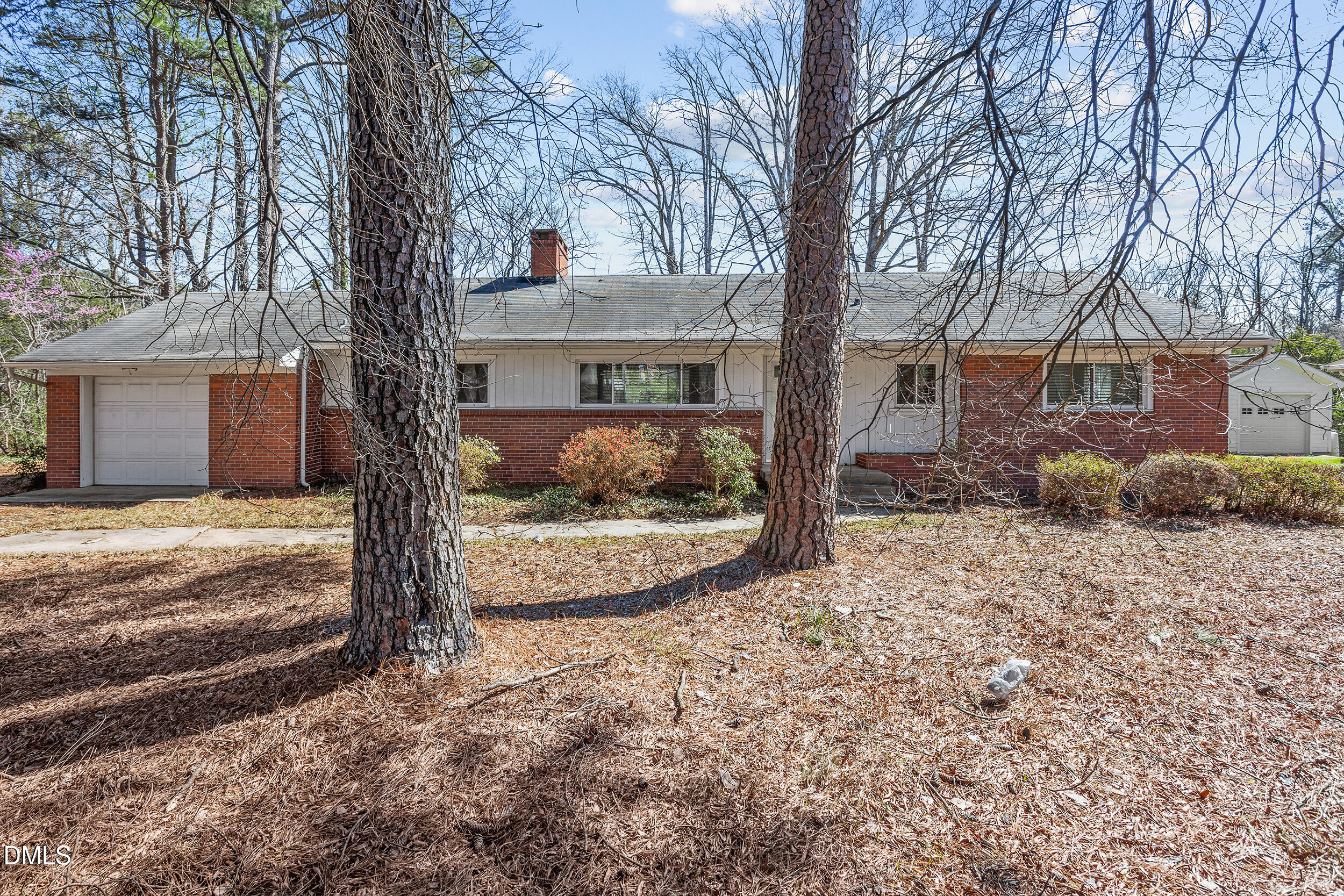 5011 Old Stage Road Raleigh, NC 27603 - Photo 7 of 29 a view of a house with a yard covered in snow