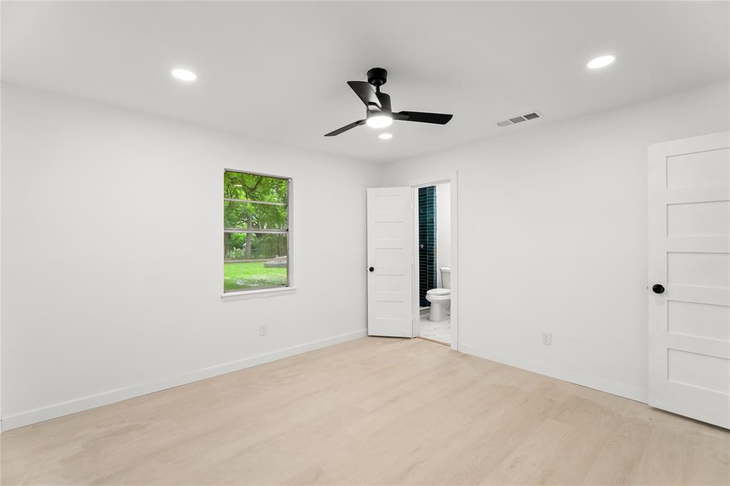 110 Hackberry Street Lancaster, TX 75146 - Photo 14 of 32 Bright room featuring light wood-finish flooring, recessed lighting, and a modern ceiling fan