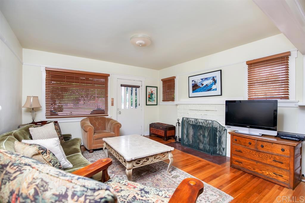 401 Alameda Coronado, CA 92118 - Photo 4 of 14 a living room with furniture and a flat screen tv