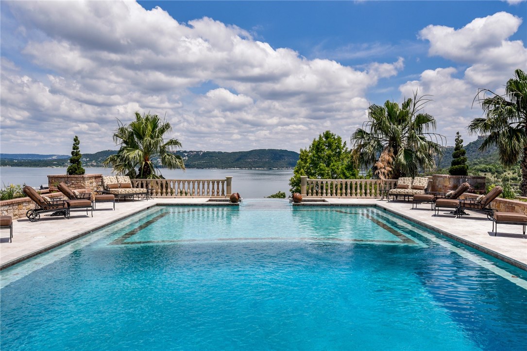 12861 Hughes Park Road Austin, TX 78732 - Photo 1 of 1 a view of swimming pool with outdoor seating
