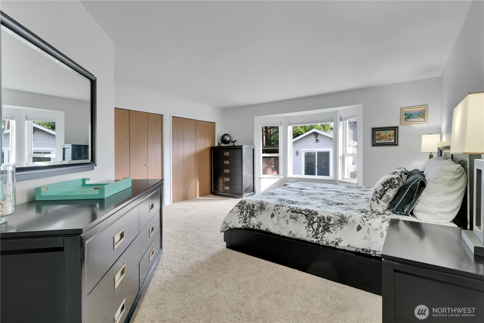 28012 236th Avenue Southeast Maple Valley, WA 98038 - Photo 20 of 39 a large bedroom with a large bed and a large window