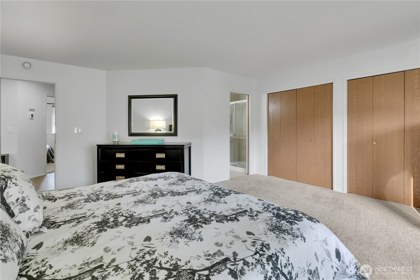 28012 236th Avenue Southeast Maple Valley, WA 98038 - Photo 21 of 39 a bedroom with a bed and a dresser