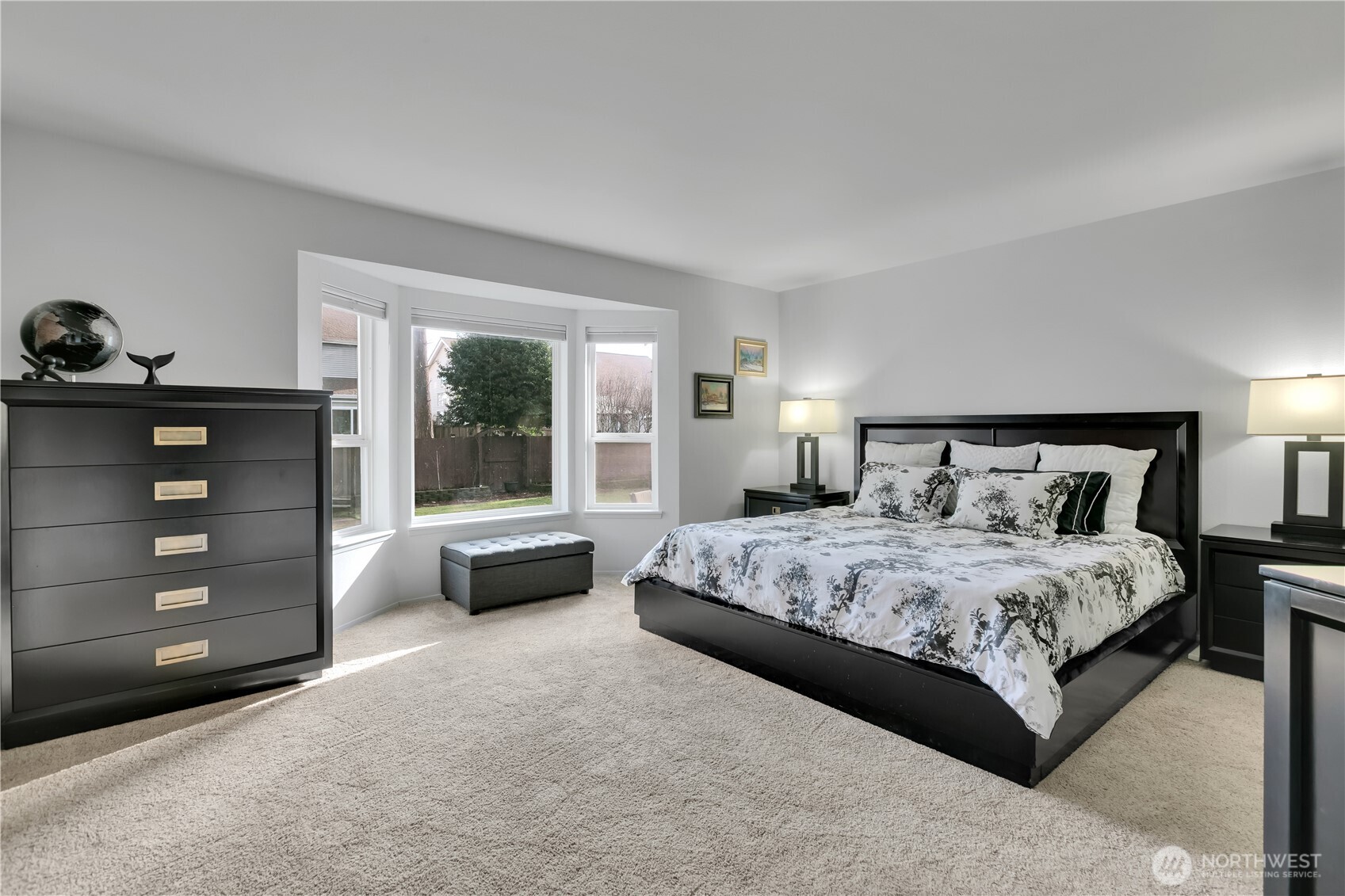 28012 236th Avenue Southeast Maple Valley, WA 98038 - Photo 22 of 39 a bedroom with a bed and a large window