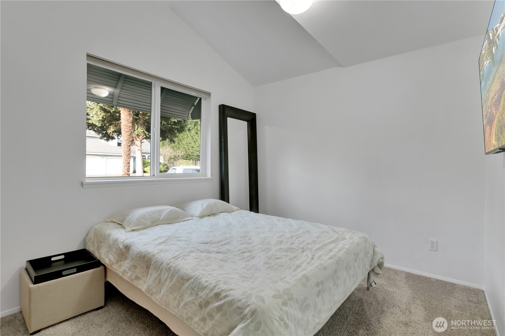 28012 236th Avenue Southeast Maple Valley, WA 98038 - Photo 27 of 39 a bedroom with a bed and a window