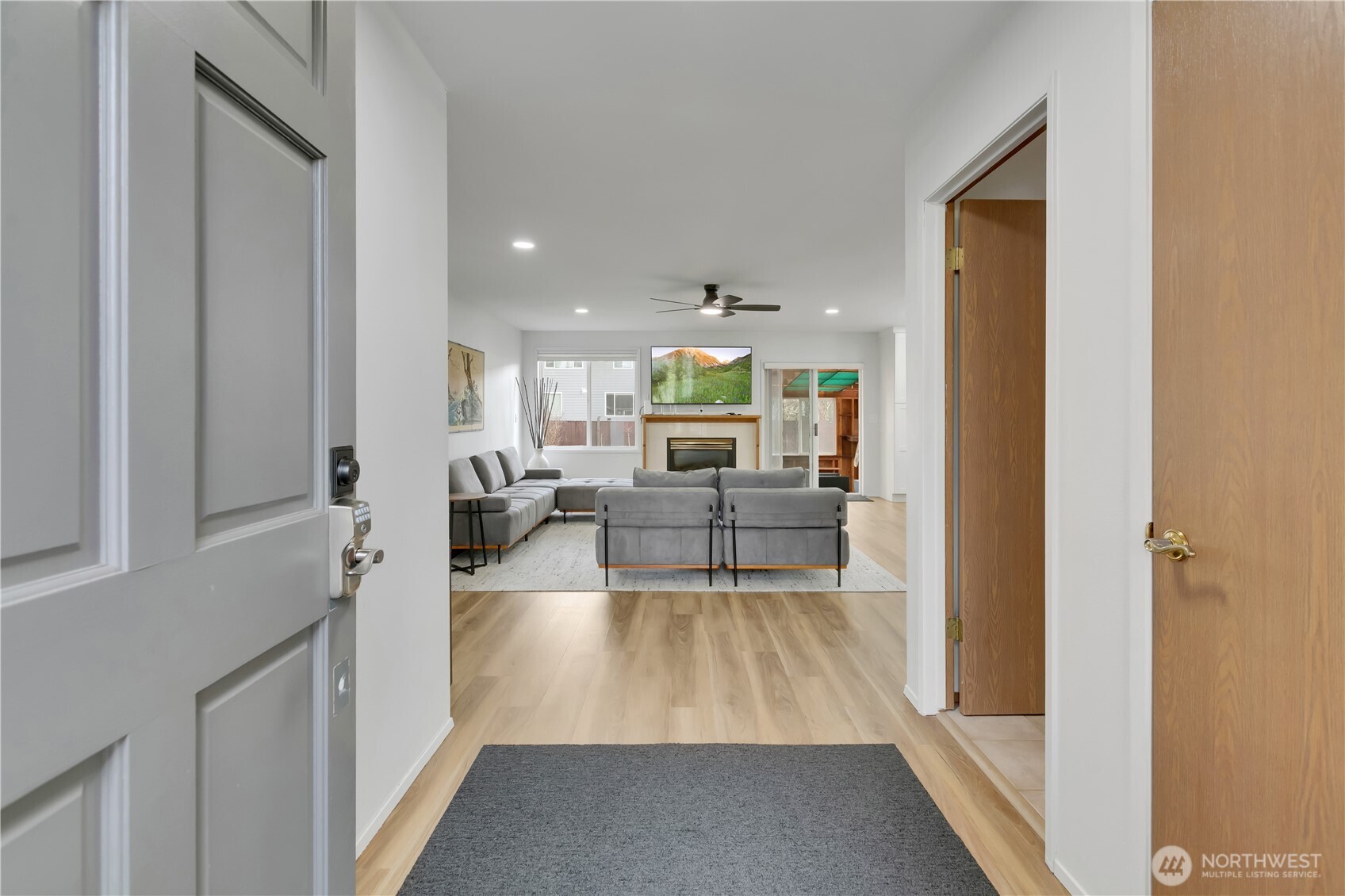 28012 236th Avenue Southeast Maple Valley, WA 98038 - Photo 4 of 39 a living room with furniture and a large window