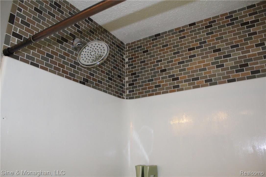 26523 Prinz Road Richmond, MI 48062 - Photo 34 of 61 CERAMIC TILE SURROUND ABOVE EASY MAINTENANCE MOLDED SHOWER UNIT!