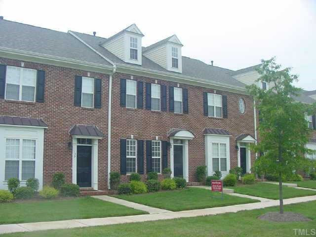 148 Savannah Ridge Road Holly Springs, NC 27540 - Photo 1 of 1 Pretty townhome overlooks a huge courtyard. Exterior Front