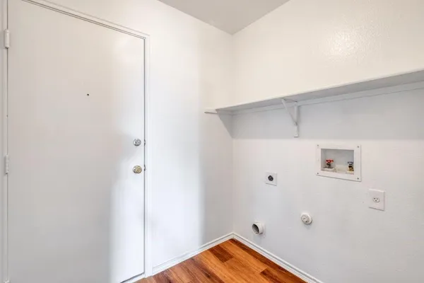 a view of small space with wooden floor