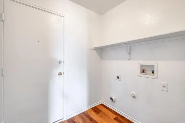 a view of small space with wooden floor