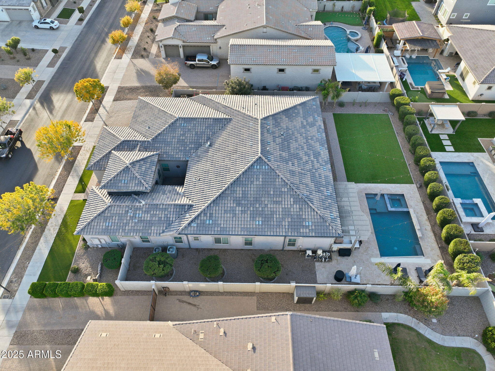 22940 East Camacho Road Queen Creek, AZ 85142 - Photo 2 of 68 an aerial view of residential houses with outdoor space