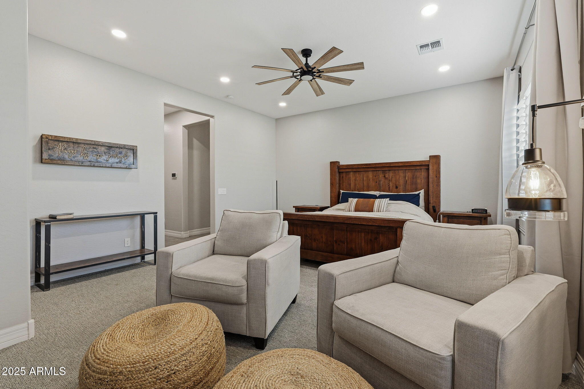 22940 East Camacho Road Queen Creek, AZ 85142 - Photo 34 of 68 a living room with furniture and a ceiling fan