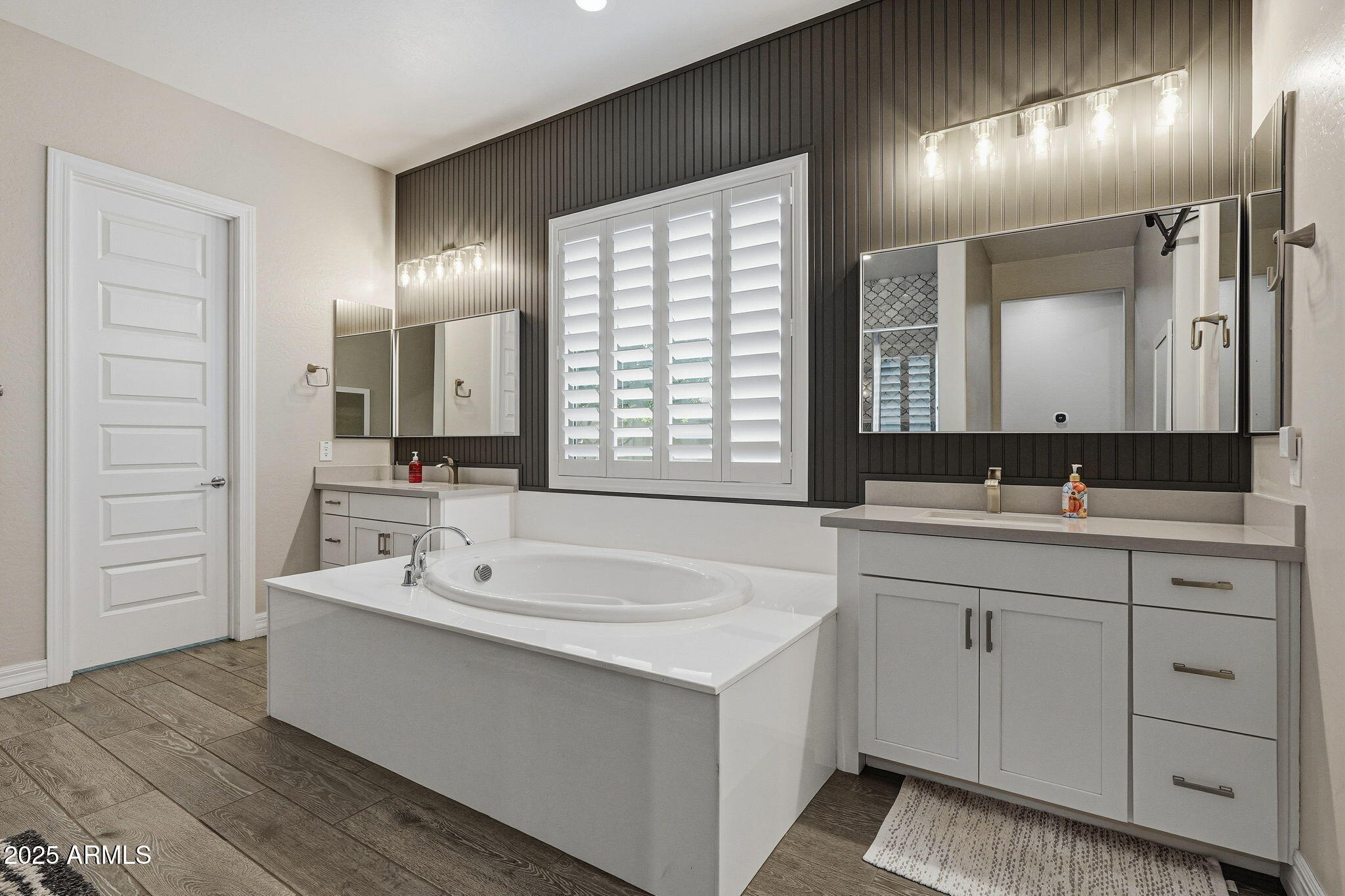 22940 East Camacho Road Queen Creek, AZ 85142 - Photo 37 of 68 a spacious bathroom with a double vanity sink mirror and double