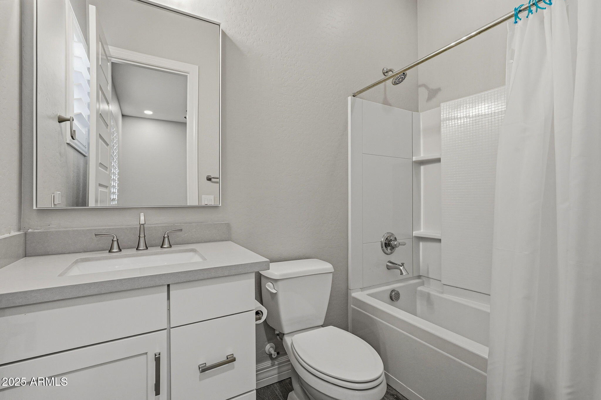 22940 East Camacho Road Queen Creek, AZ 85142 - Photo 46 of 68 a bathroom with a toilet sink vanity tub and shower