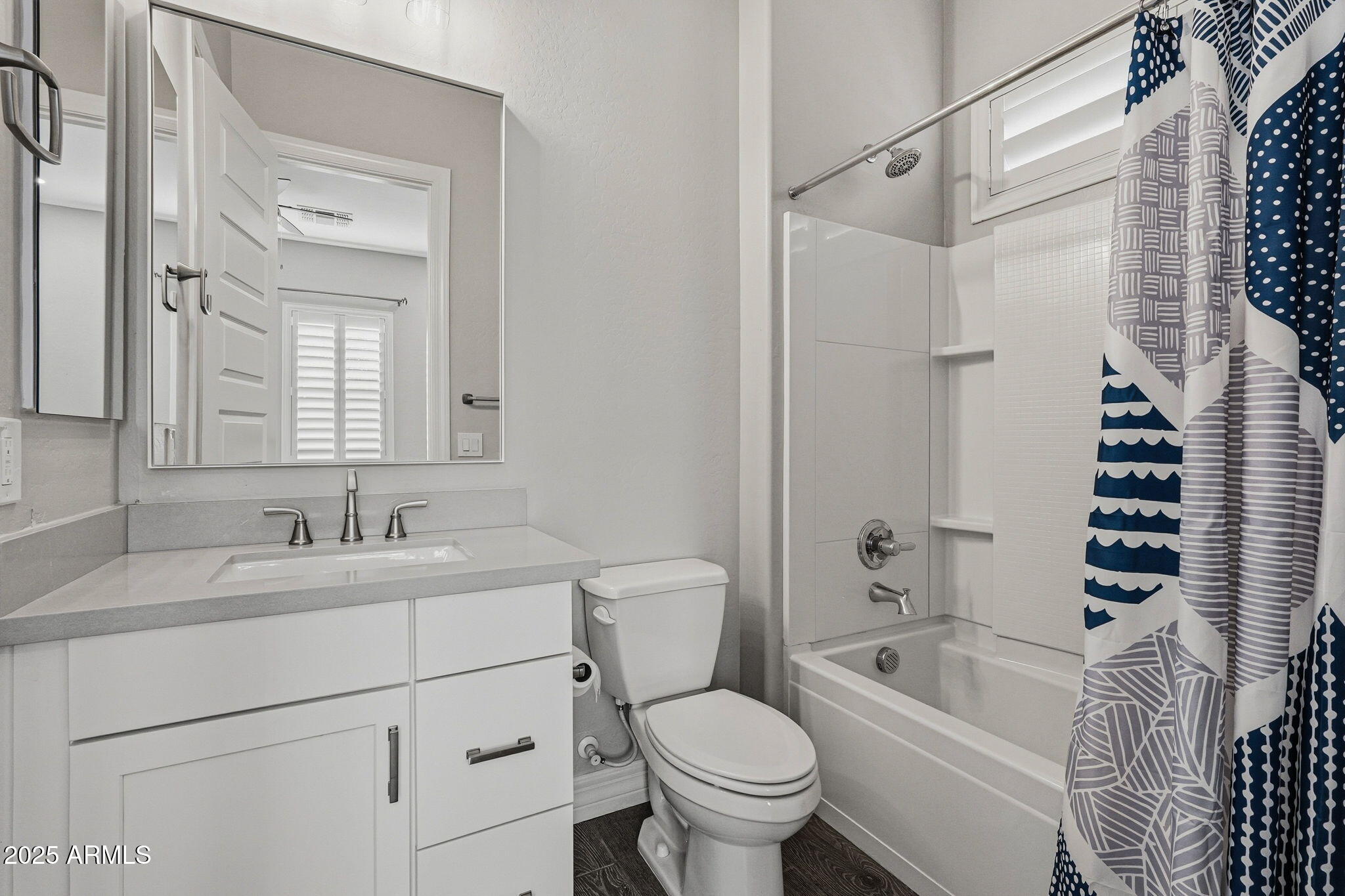 22940 East Camacho Road Queen Creek, AZ 85142 - Photo 48 of 68 a bathroom with a sink toilet a shower and a mirror