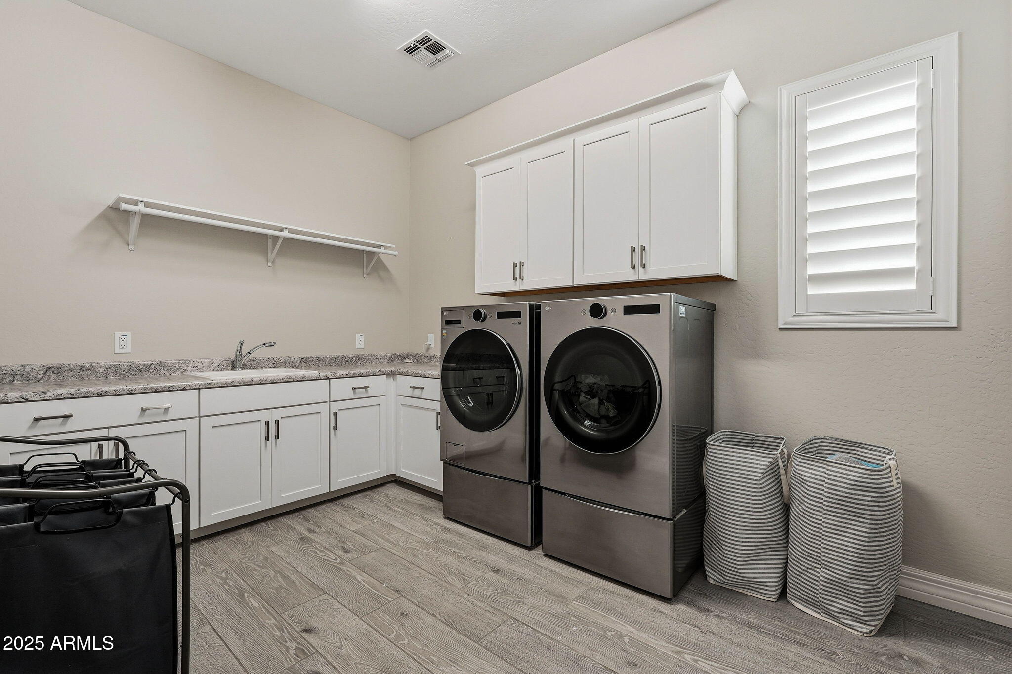 22940 East Camacho Road Queen Creek, AZ 85142 - Photo 50 of 68 a utility room with sink dryer and washer