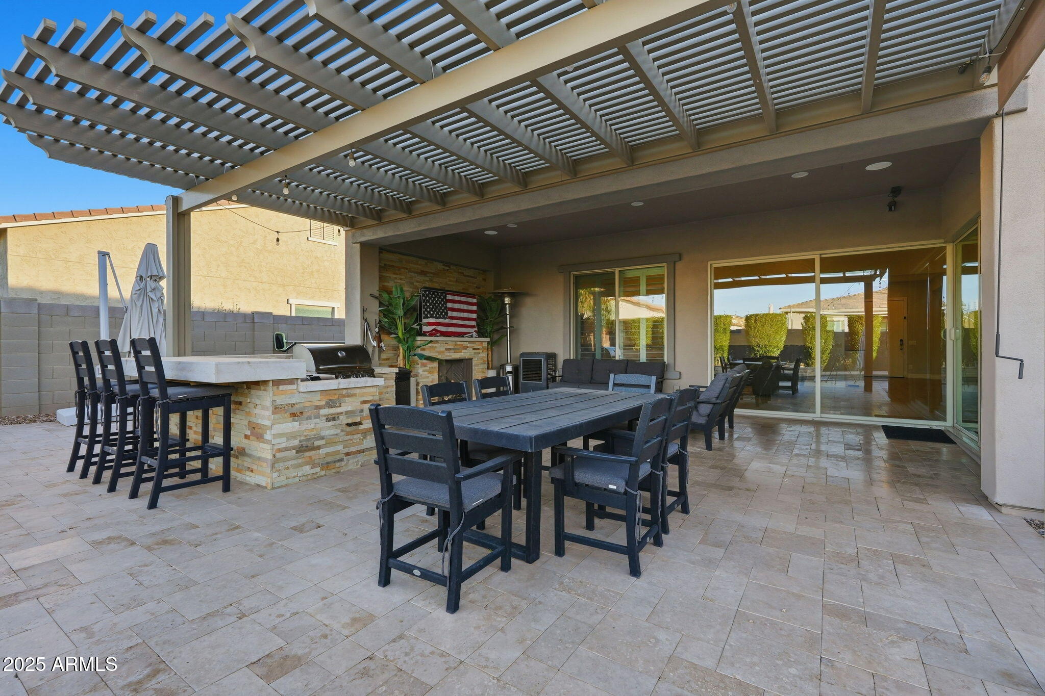 22940 East Camacho Road Queen Creek, AZ 85142 - Photo 55 of 68 a dining room with furniture and a garden view